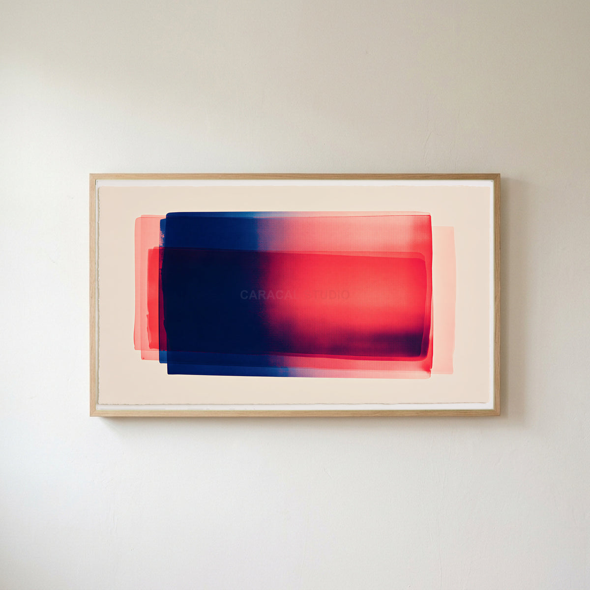Color field Frame TV art in an oak frame on a warm white wall