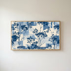 Blue botanical Frame TV art in an oak frame on a warm white wall