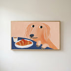 Dog with a croissant Frame TV art in an oak frame on a warm white wall