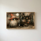 Ghost witch and black cat Frame TV art in an oak frame on a warm white wall