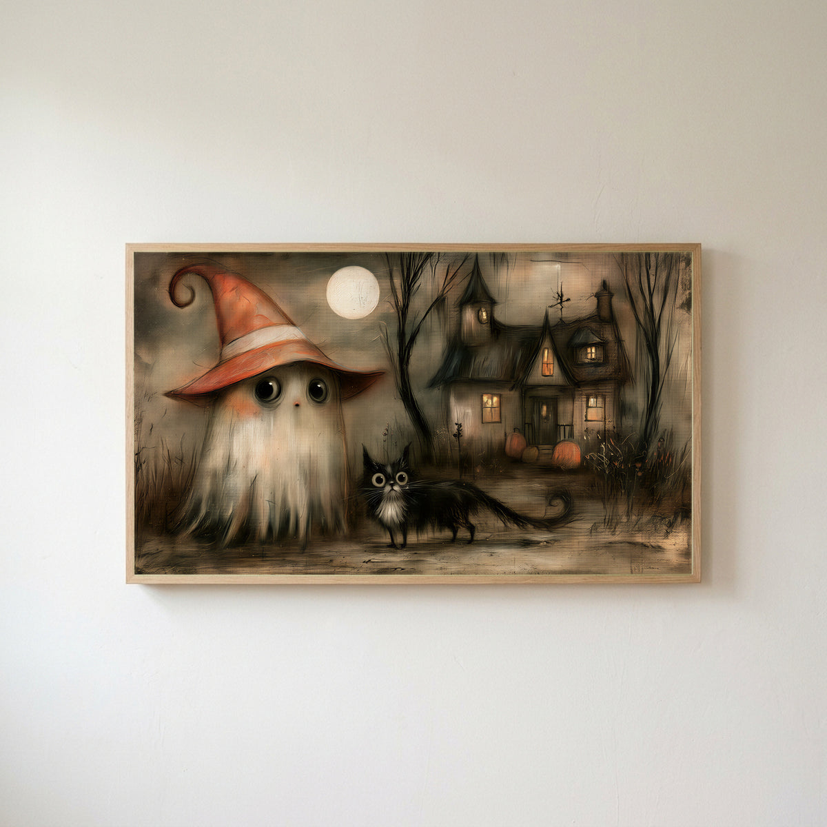 Ghost witch and black cat Frame TV art in an oak frame on a warm white wall
