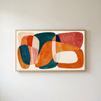 Organic shapes Frame TV art in an oak frame on a warm white wall