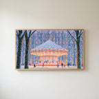Snowy carousel Frame TV art in an oak frame on a warm white wall