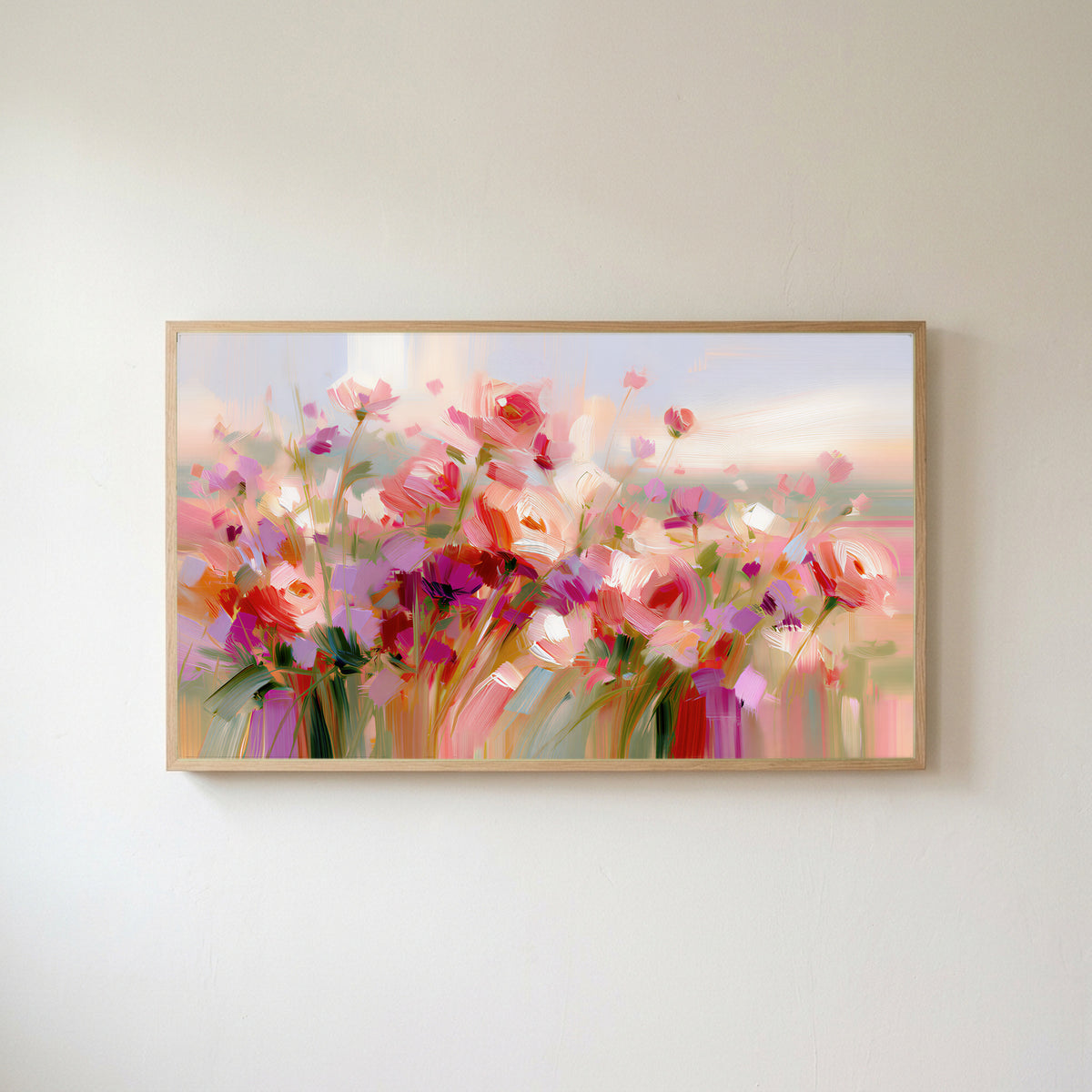 Pink wildflower meadow Frame TV art in an oak frame on a warm white wall