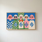 Retro women in sunglasses Frame TV art in an oak frame on a warm white wall