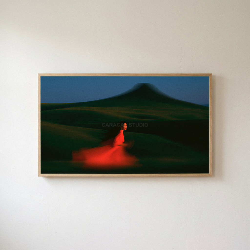 Woman running over green hills Frame TV art in an oak frame on a warm white wall