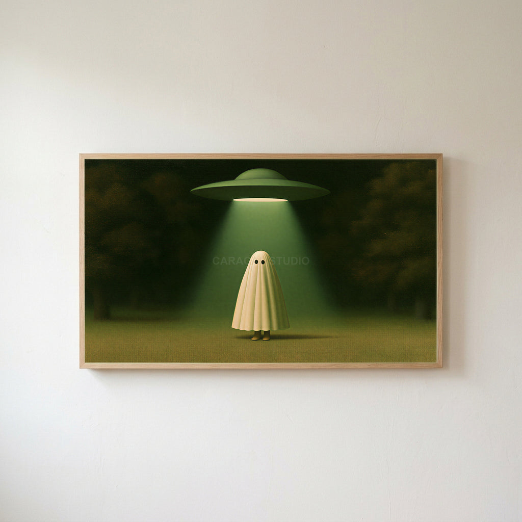 Ghost and UFO Frame TV art in an oak frame on a warm white wall