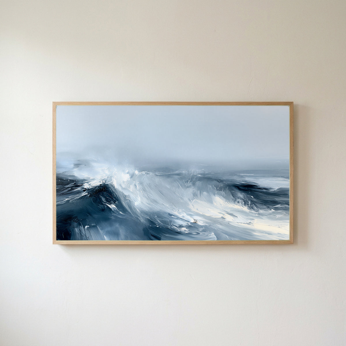 Ocean waves Frame TV art in an oak frame on a warm white wall