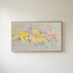 Pastel flower Frame TV art in an oak frame on a warm white wall