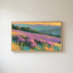 Heather hills Frame TV art in an oak frame on a warm white wall
