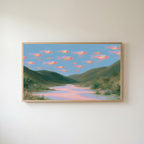 Flying fish Frame TV art in an oak frame on a warm white wall