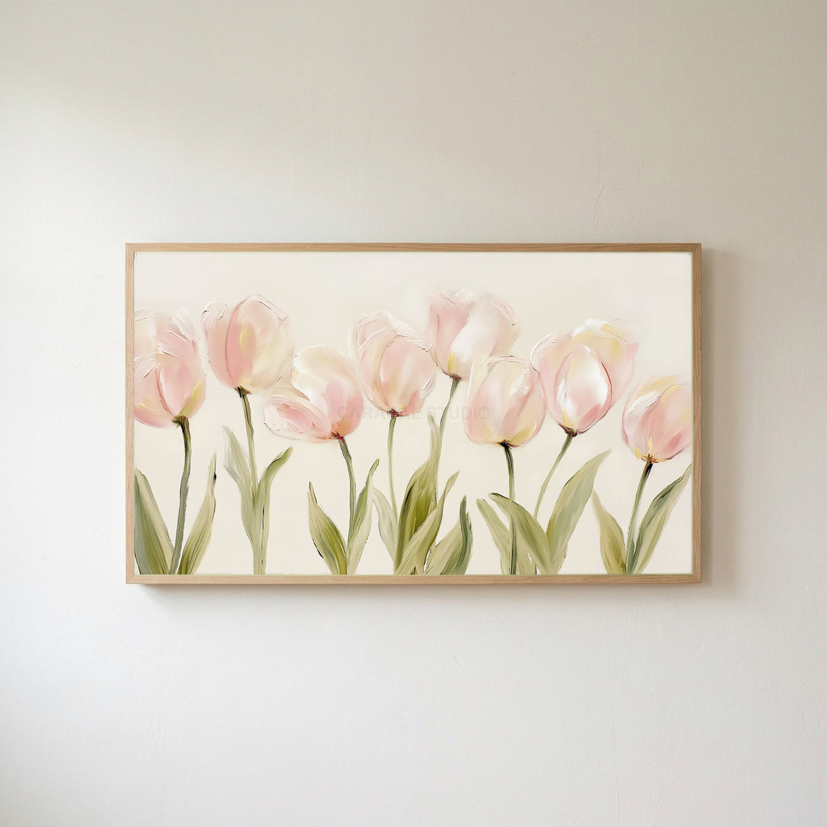 Pink tulip Frame TV art in an oak frame on a warm white wall