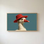 Duck in a red hat Frame TV art in an oak frame on a warm white wall