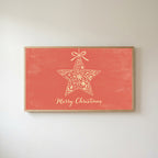 Star ornament Frame TV art in an oak frame on a warm white wall