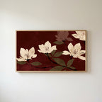 Cream blossoms on burgundy Frame TV art in an oak frame on a warm white wall