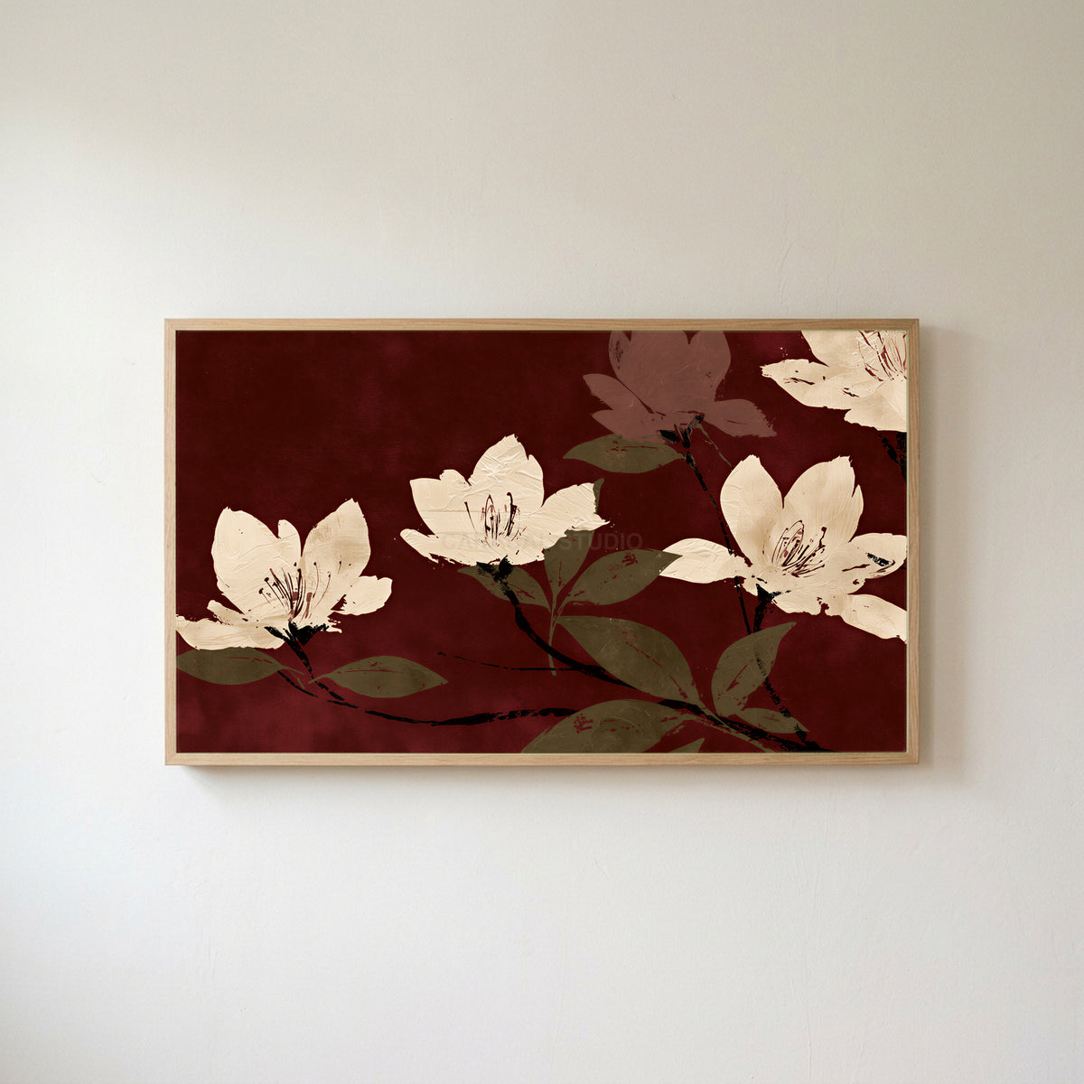 Cream blossoms on burgundy Frame TV art in an oak frame on a warm white wall