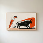 Matador and bull Frame TV art in an oak frame on a warm white wall