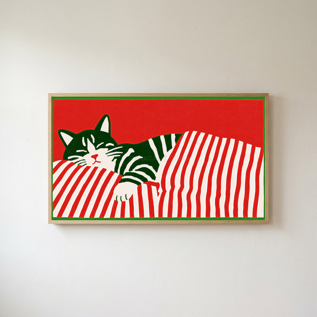 Sleeping cat and candy cane stripes Frame TV art in an oak frame on a warm white wall