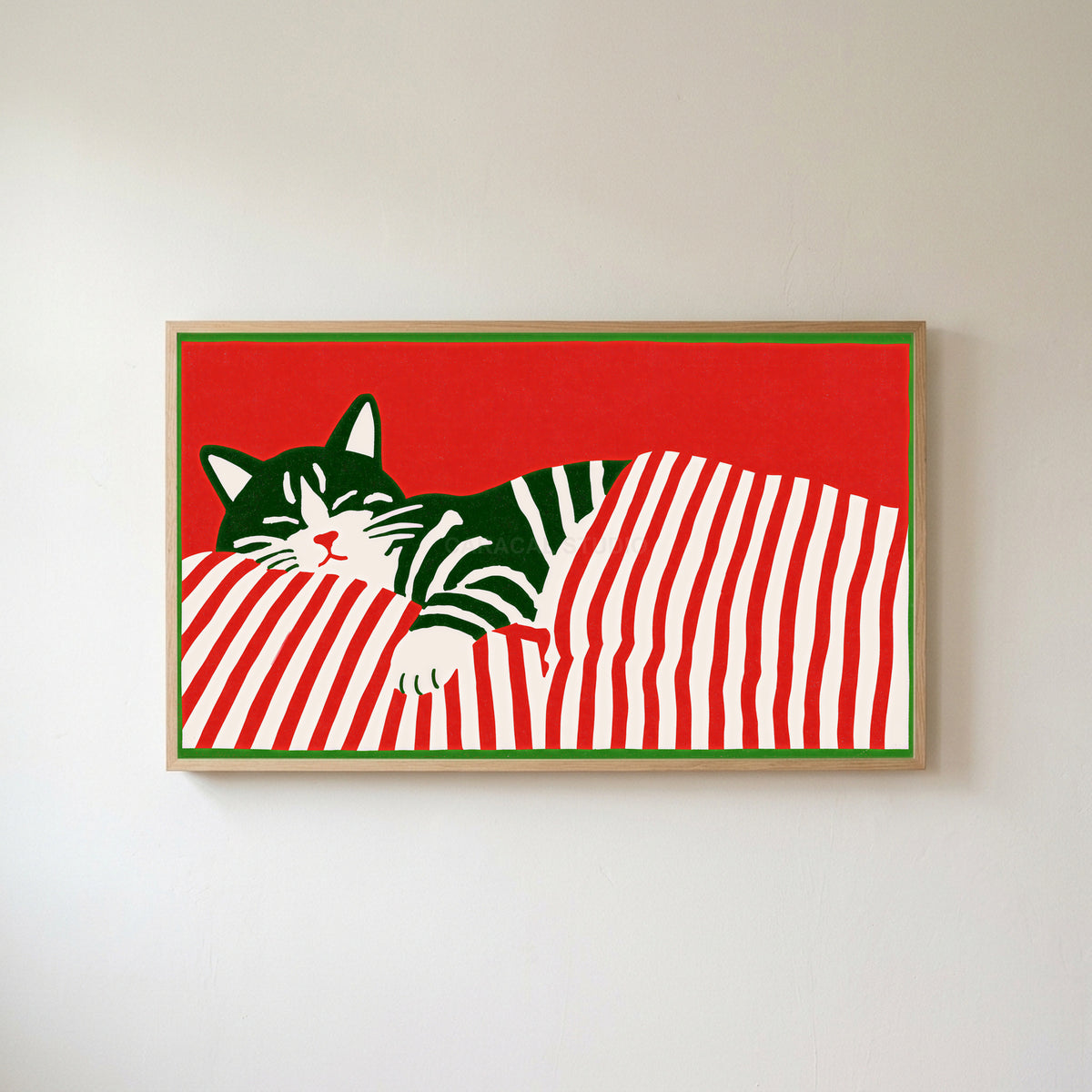Sleeping cat and candy cane stripes Frame TV art in an oak frame on a warm white wall