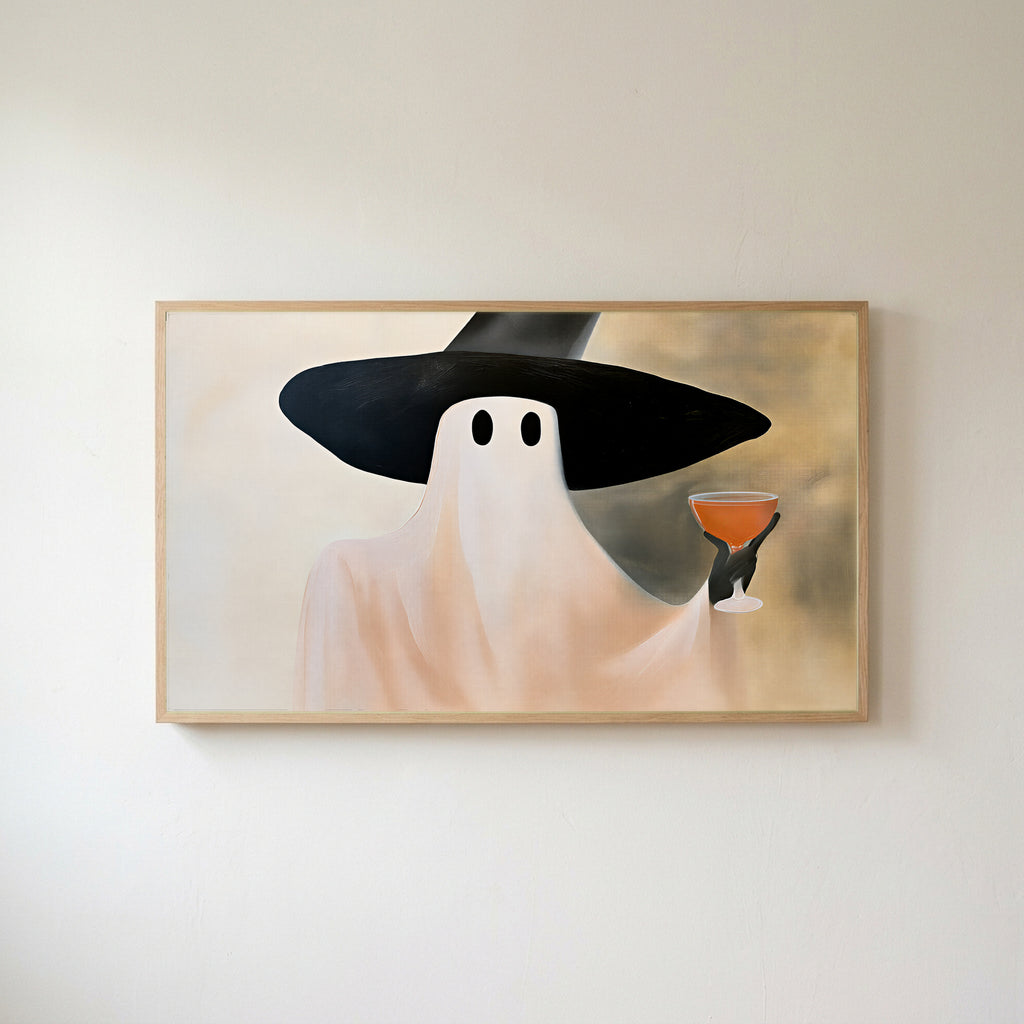 Ghost witch with a cocktail Frame TV art in an oak frame on a warm white wall
