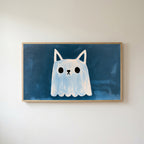 Cat eared ghost Frame TV art in an oak frame on a warm white wall