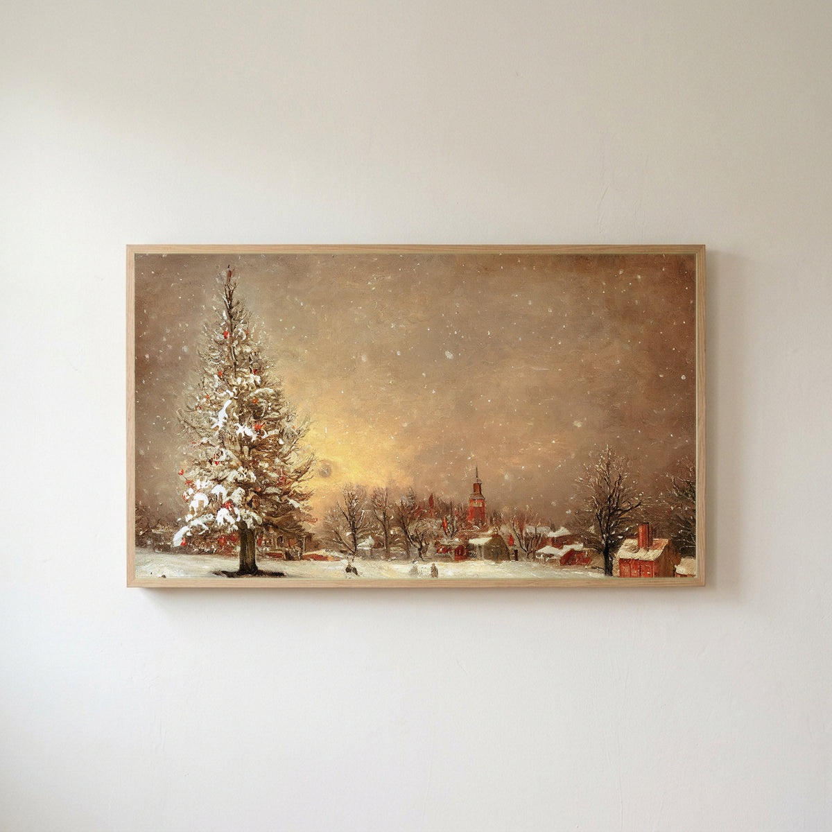 Snowy tree and village Frame TV art in an oak frame on a warm white wall
