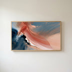 Coral and navy abstract Frame TV art in an oak frame on a warm white wall