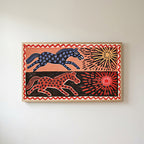 Folk star horses Frame TV art in an oak frame on a warm white wall
