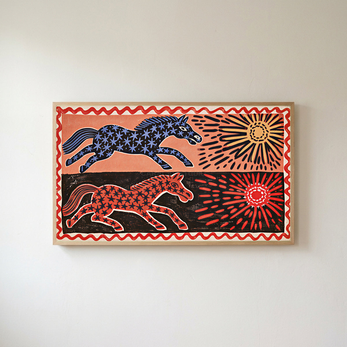 Folk star horses Frame TV art in an oak frame on a warm white wall