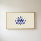 Mystic eye Frame TV art in an oak frame on a warm white wall