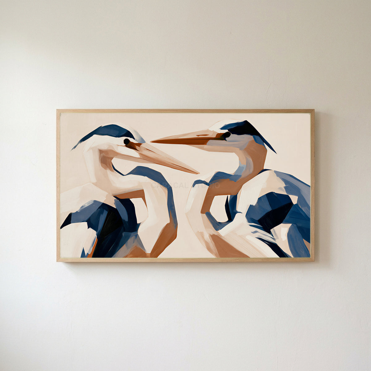 Blue heron Frame TV art in an oak frame on a warm white wall