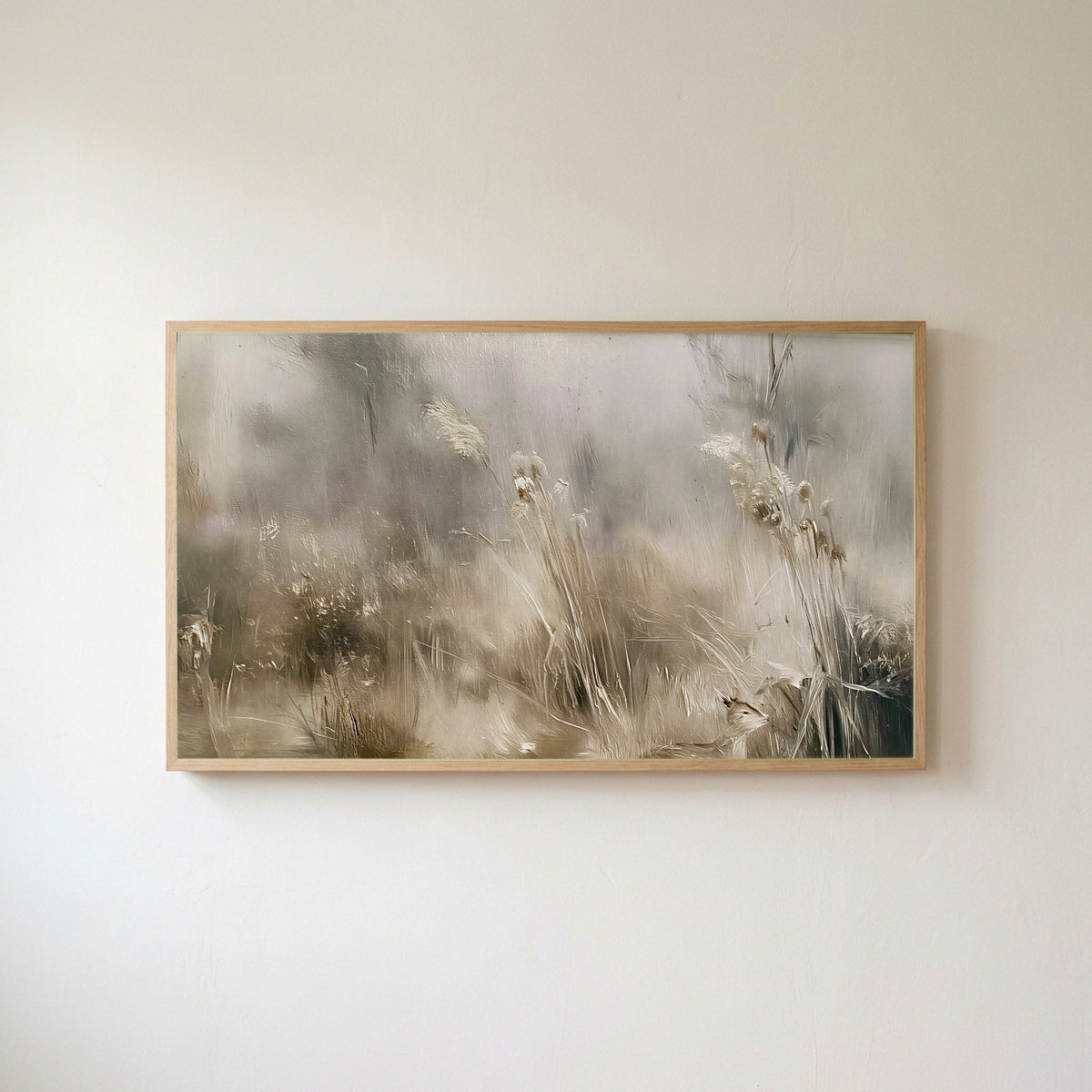 Misty meadow Frame TV art in an oak frame on a warm white wall