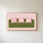 Green sofa Frame TV art in an oak frame on a warm white wall