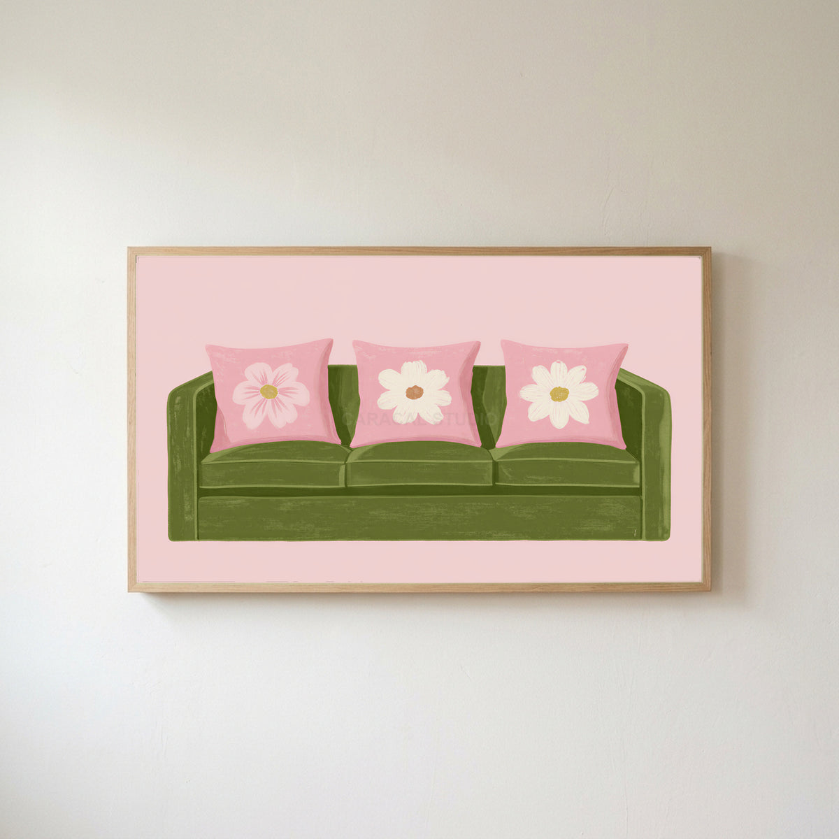 Green sofa Frame TV art in an oak frame on a warm white wall