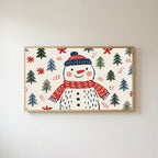 Snowman Frame TV art in an oak frame on a warm white wall