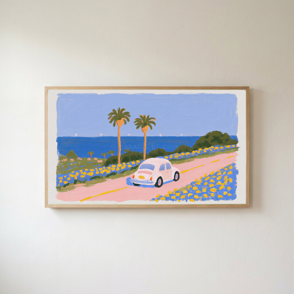 Seaside car Frame TV art in an oak frame on a warm white wall