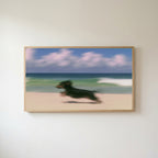 Running beach dachshund Frame TV art in an oak frame on a warm white wall