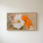 Poppy Frame TV art in an oak frame on a warm white wall
