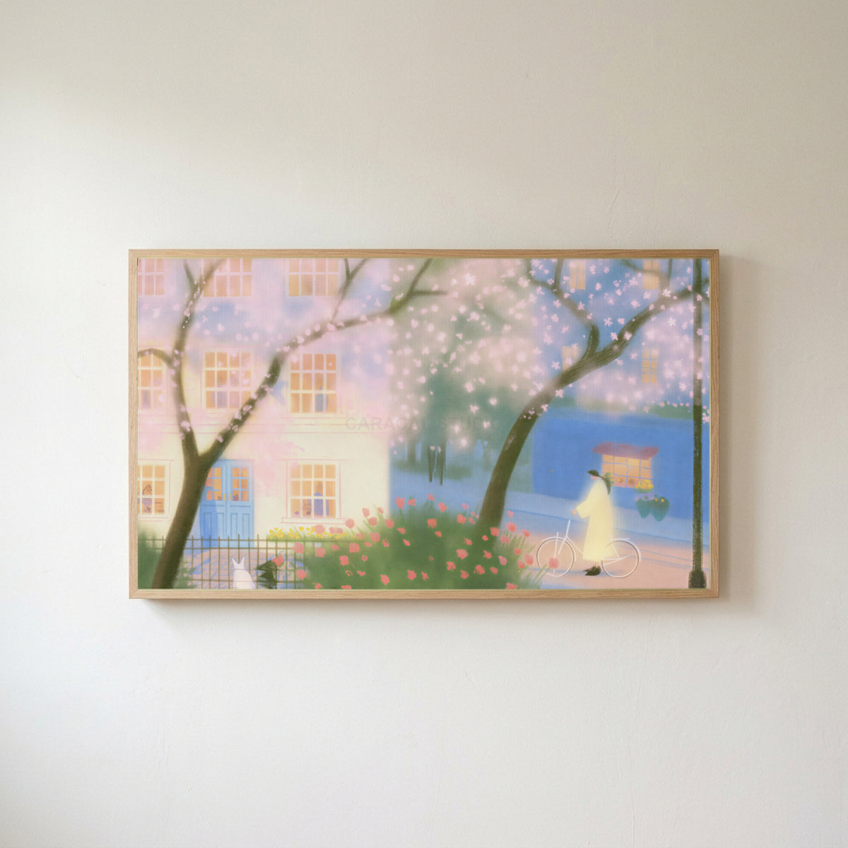 Cherry blossom street Frame TV art in an oak frame on a warm white wall