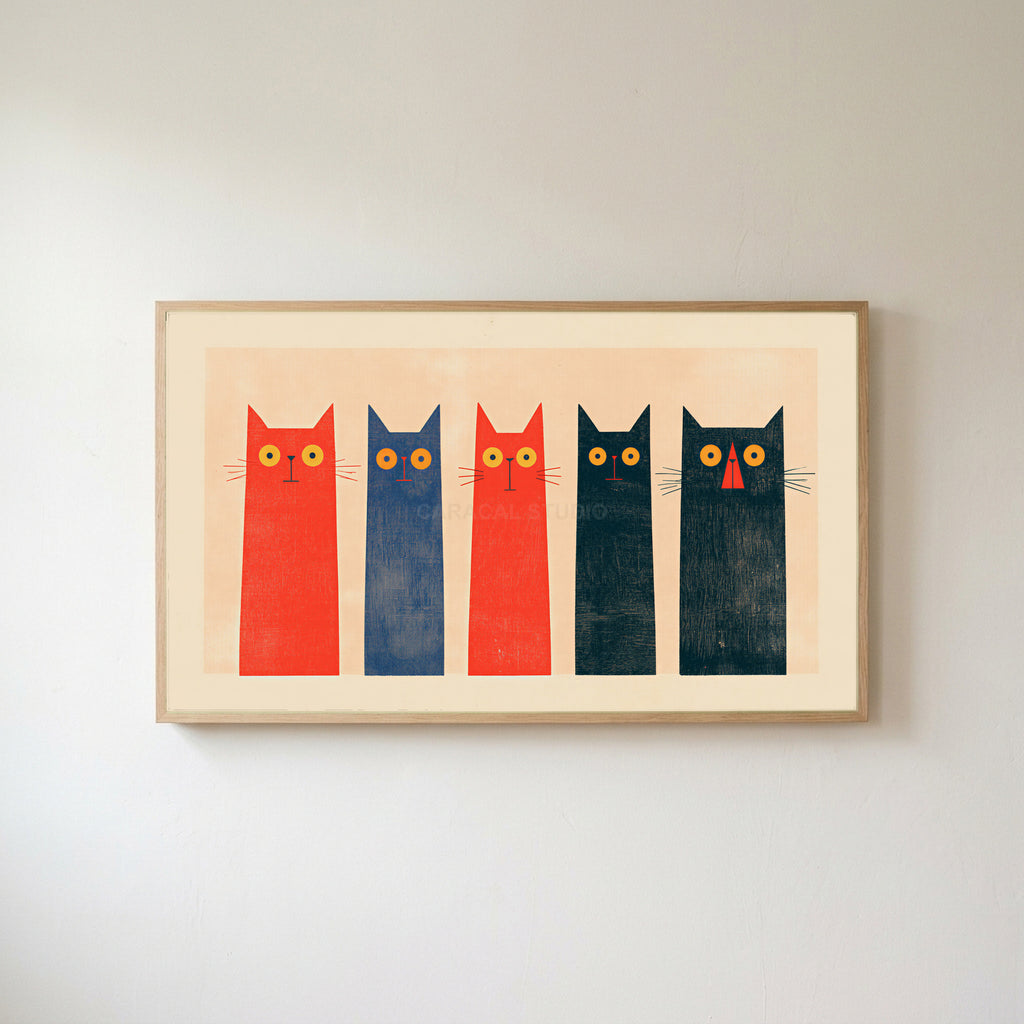 Five tall cats Frame TV art in an oak frame on a warm white wall