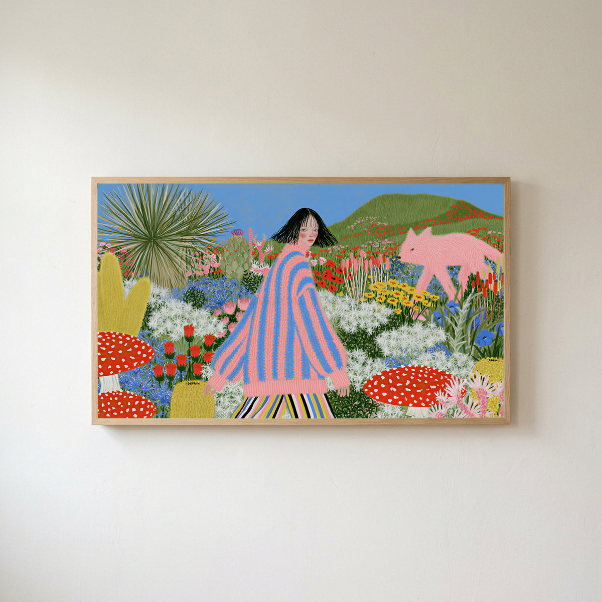 Flower garden and pink fox Frame TV art in an oak frame on a warm white wall