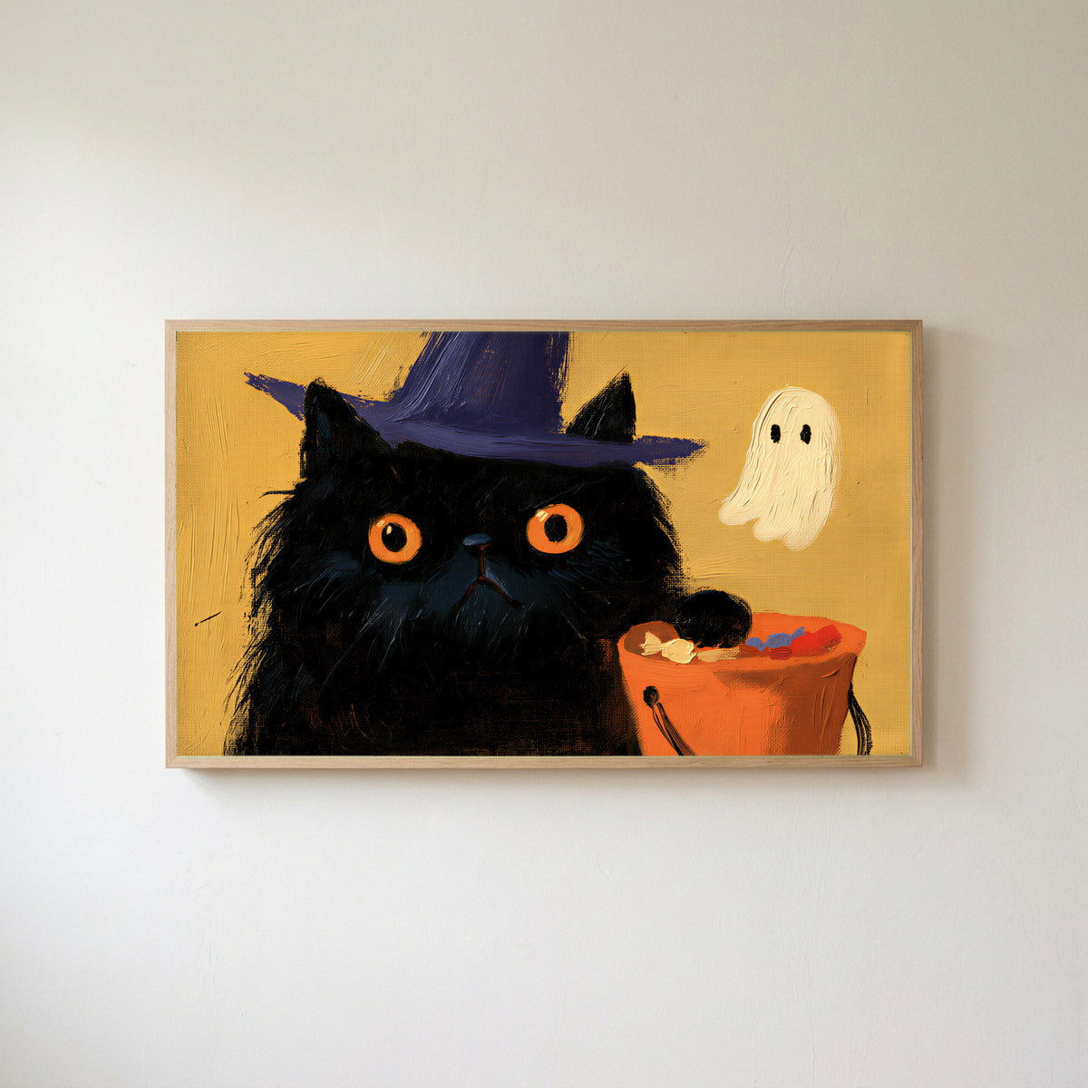 Black cat in a witch hat Frame TV art in an oak frame on a warm white wall