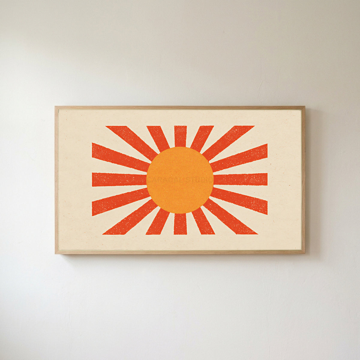 Retro sunburst Frame TV art in an oak frame on a warm white wall