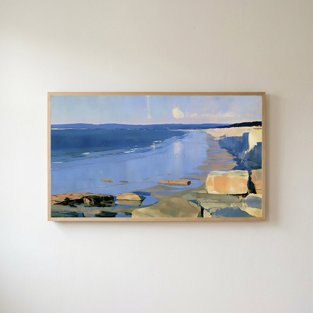 Low tide beach and cliffs Frame TV art in an oak frame on a warm white wall