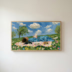 Picnic reader in a meadow Frame TV art in an oak frame on a warm white wall