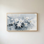 White flower Frame TV art in an oak frame on a warm white wall