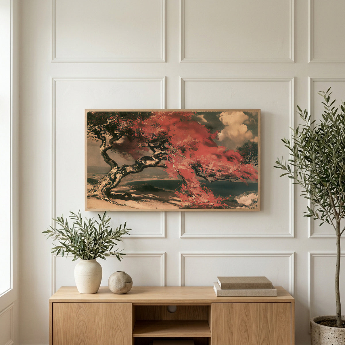 Japanese tree landscape art on a TV above a light oak sideboard with olive branches in a bright living room