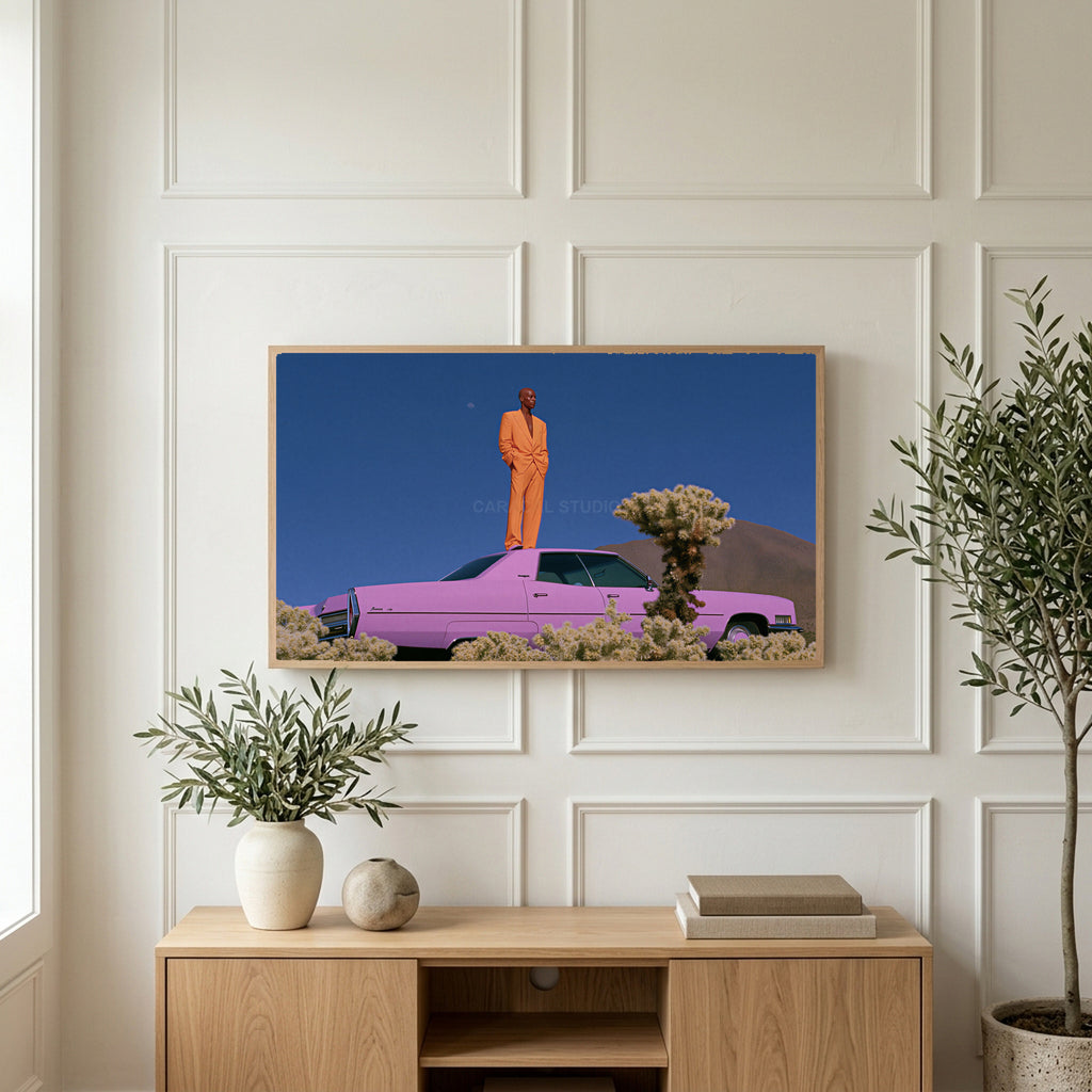 Pink car in the desert art on a TV above a light oak sideboard with olive branches in a bright living room