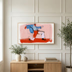 Dancing man line art on a TV above a light oak sideboard with olive branches in a bright living room