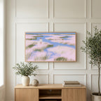 Pastel wetland walker art on a TV above a light oak sideboard with olive branches in a bright living room